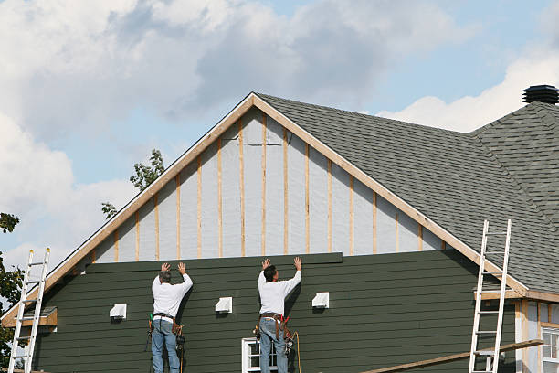 Professional Storm Damage Siding Repair technician working in Rockton, IL